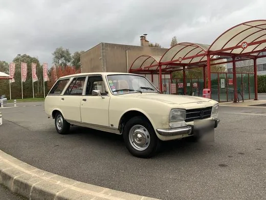 Peugeot 504 Break beige, Années 70 · Break familial